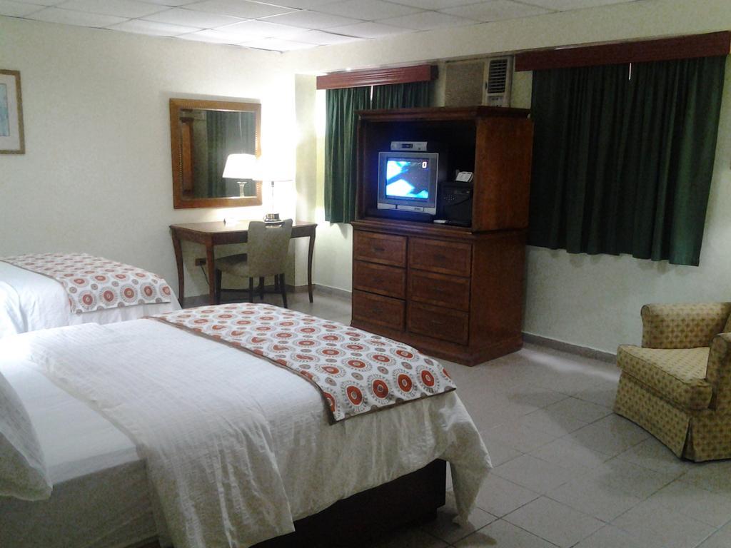 Micro Hotel Condo Suites Santo Domingo Room photo